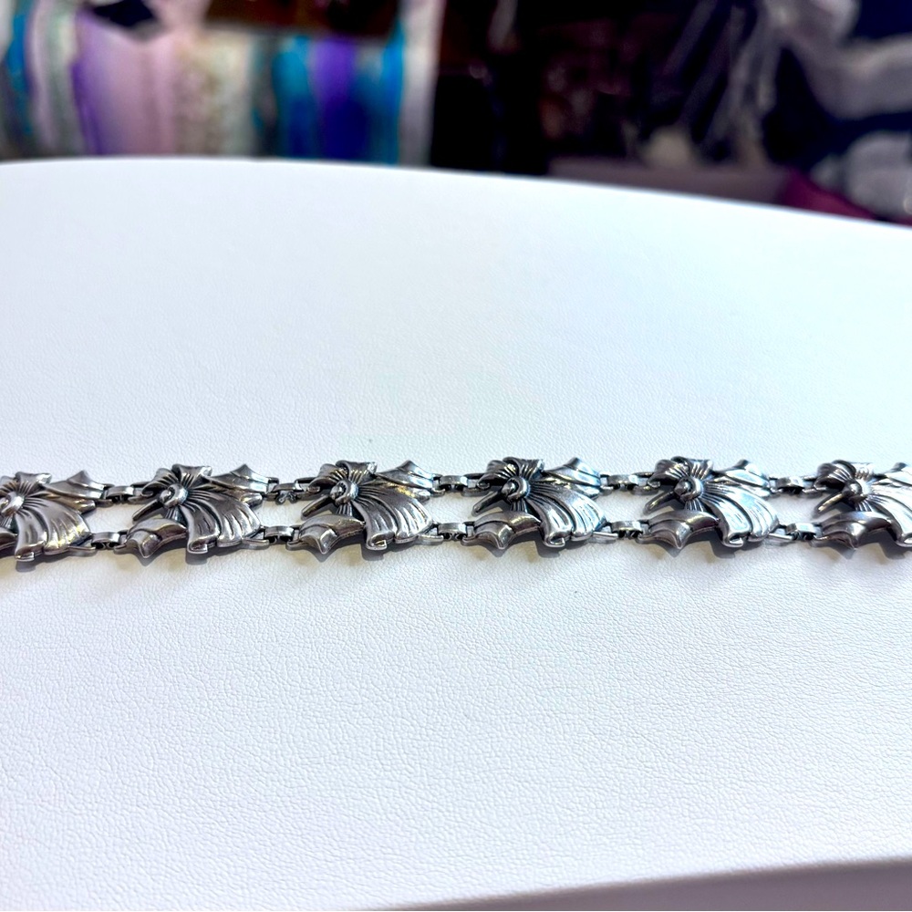 Elegant Sterling Silver Bracelet with vintage bow design.  Beautiful and elegant